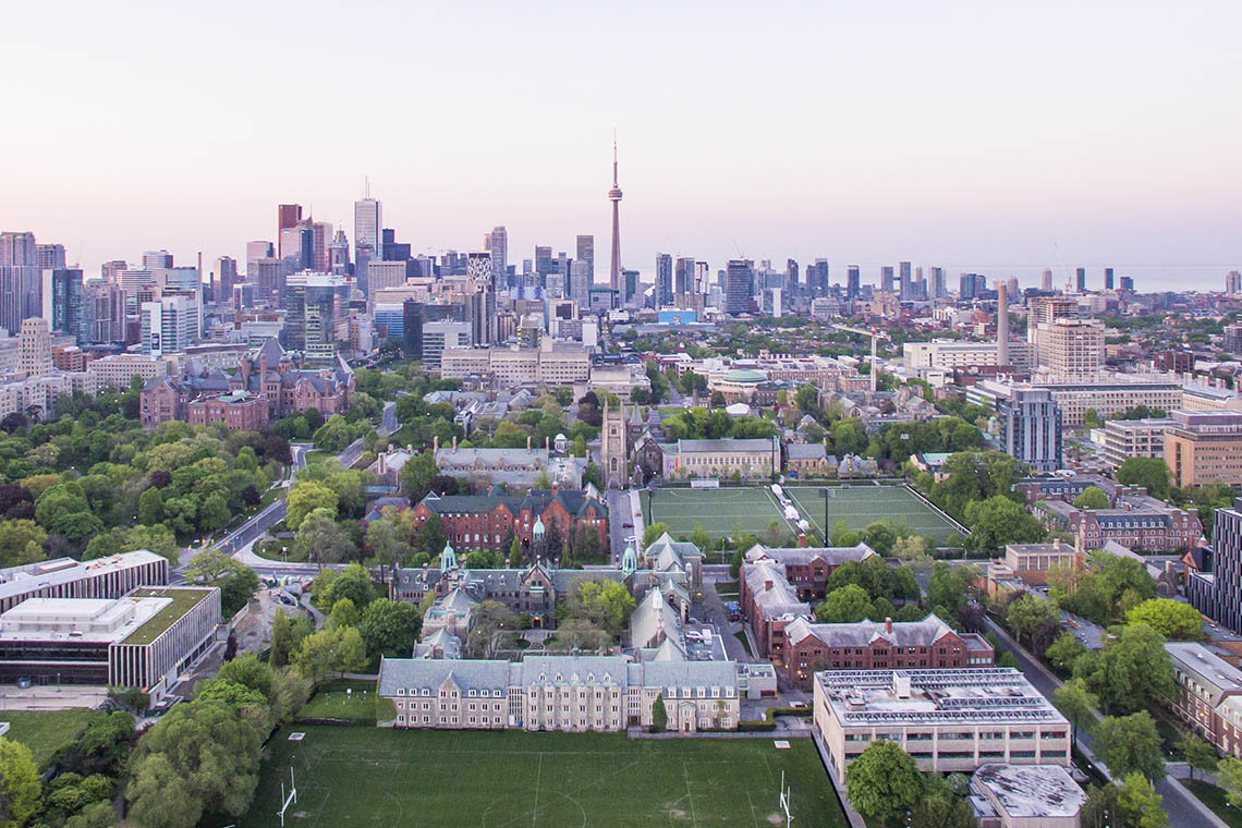 Aerial view of University of Toronto against city skyline